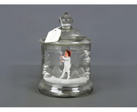 Victorian Mary Gregory glass lidded storage jar, with typical enamel decoration depicting a young boy in an outside setting, 