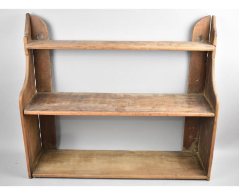 An Edwardian Wall Hanging Three Shelf Unit, 63cm wide 