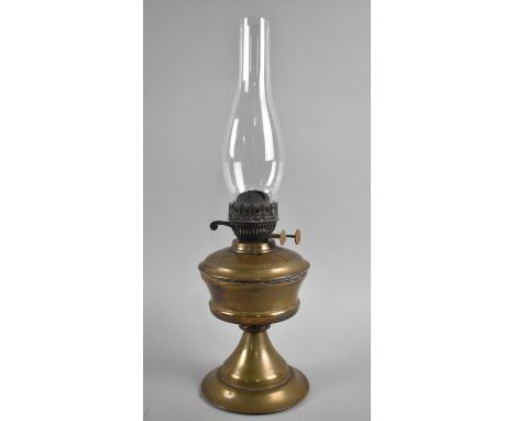 An Early 20th Century Brass Oil Lamp, with Glass Chimney 