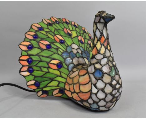 A Reproduction Tiffany Style Novelty Table Lamp in the Form of a Peacock, 28cms High 