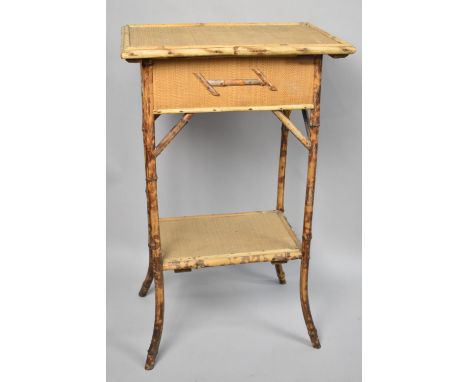 An Edwardian Bamboo Sewing Box Table with hinged Lid, Stretcher Shelf, 47cms Wide 