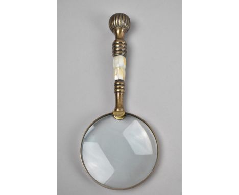 A Brass and Mother of Pearl Handled Desktop Magnifying Glass, 26cms Long 