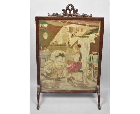 A Late Victorian Mahogany Framed Fire Screen with Tapestry Centre depicting mother and Child, 56cms Wide 