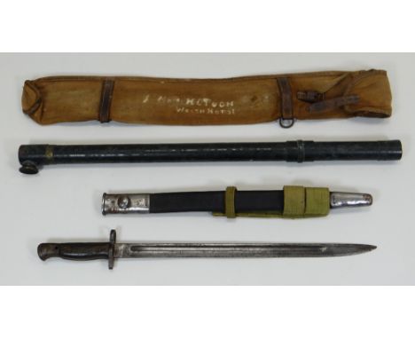 A WWI BAYONET with scabbard together with a J H Steward Ltd sight, 54cms long 