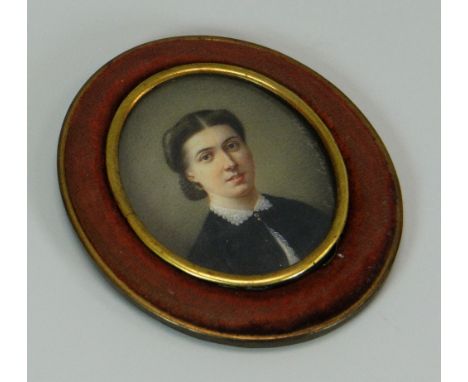 A FINE MINIATURE PORTRAIT OF A LADY probably on ivory, of oval form, the obverse inscribed with indistinct name and dated 186