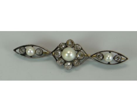 A VICTORIAN CUT DIAMOND & PEARL BROOCH propeller-shaped and set in yellow and white gold and comprising twelve diamonds, visu