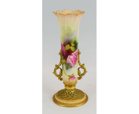 A ROYAL WORCESTER TWIN HANDLED VASE on a spreading circular foot with lattice work moulding, the twin handles of feathered an