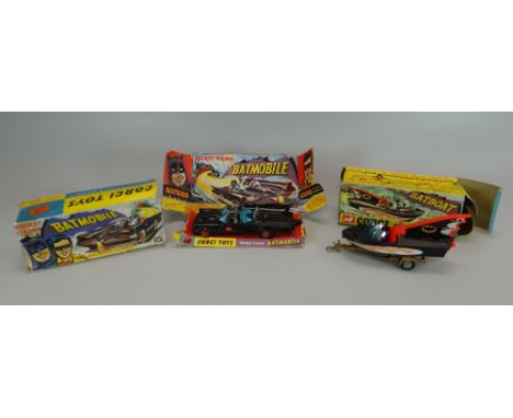 A BOXED CORGI TOY BAT MOBILE with Batman & Robin together with a Bat Boat