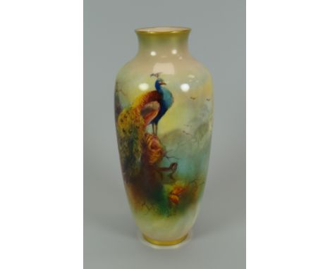 A SMALL NARROW-NECKED ROYAL WORCESTER VASE painted with peacocks in a fir tree, signed A Watkins, 13.5cms high, date mark for