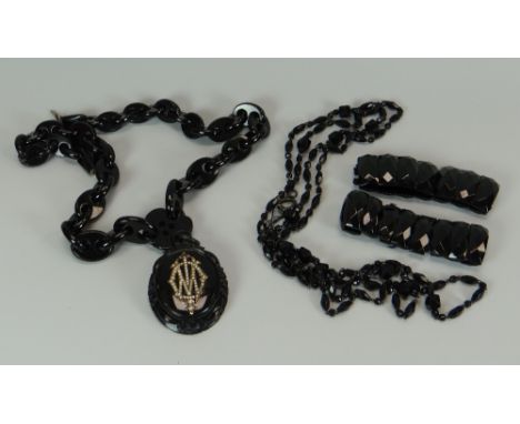 A PARCEL OF BLACK JET JEWELLERY including necklet with seed pearl centre-piece, two expander bracelets etc Provenance: entere