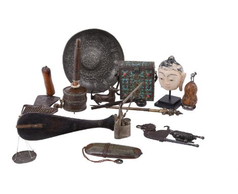 A miscellaneous group of Asian objects, mostly 19th century, including two opium pipes, a Burmese hair pin(?), a pair of Java