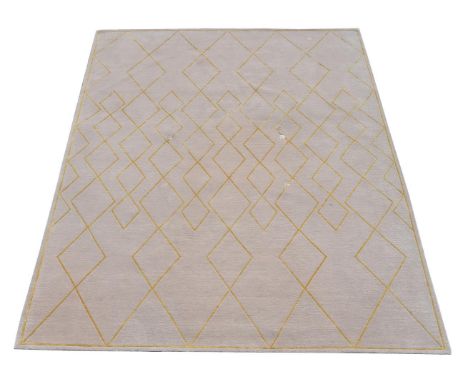 Tim Gosling for The Rug Company, Deco Diamond Light, a cream and gold carpet, with lozenge designs to the cream field, recent