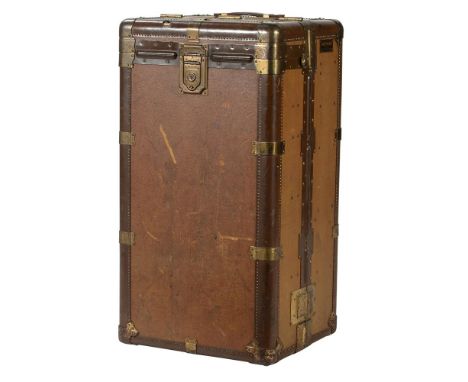 A Hartmann travelling trunk, 20th century, Gibraltarized, and with fitted interior, the leather strap handle numbered 1 803 2