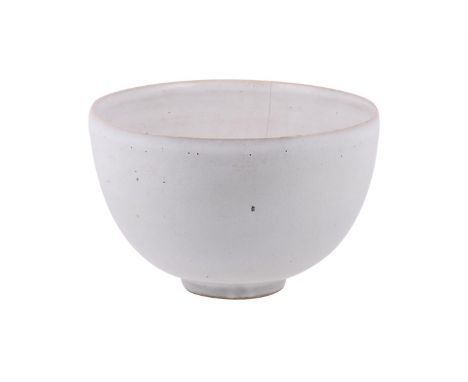 λ A Rupert Spira stoneware studio bowl, with white speckled glaze, on a footed base, raised RS mark, 26cm wide x 16.8cm high 