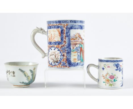 Group of three Chinese porcelain pieces. Includes two mugs and one tea bowl, which is decorated with an interior scene and a 