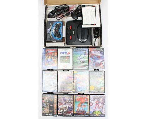 Sega: A boxed Sega Mega Drive II console, together with twelve assorted cased games to include: Sonic, FIFA Soccer 96 and oth