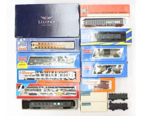 Model Railway: A collection of assorted HO Scale rolling stock and coaches to include: Roco, Jouef, Liliput, Lima and other e
