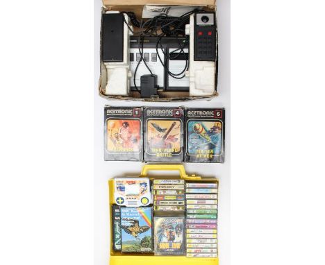 Acetronic: A boxed Acetronic MPU1000 console, together with three boxed games, and a collection of assorted cased Spectrum ga