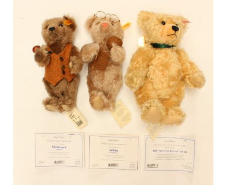 Steiff: A collection of three Steiff bears to comprise: Grandpa, Grandma and The 'Button in Ear' Bear, all complete with cert