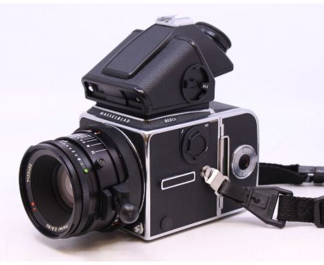 Hasselblad: A Hasselblad 503CX, Medium Format Camera, Serial No. RE 1428680, complete with three Hasselblad film backs, seria