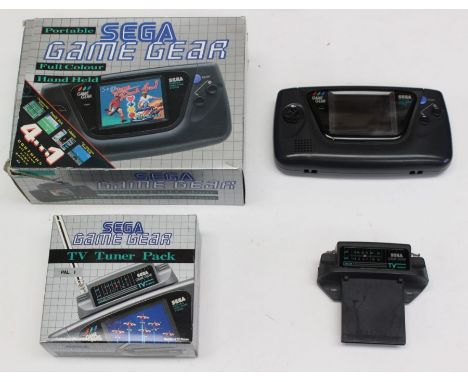 Sega: A boxed Sega Game Gear Portable, Full Colour, handheld console; together with a boxed Sega Game Gear TV Tuner Pack. (2)