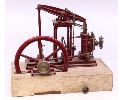 Live Steam: A stationary live steam, beam engine, upon plinth, possibly hand-built as no manufacturer name can be seen, in ne