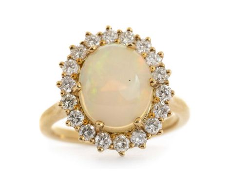 OPAL AND DIAMOND CLUSTER RING, set with a cabochon opal within a halo of diamonds totalling approximately 0.80 carats, in nin