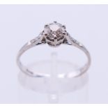 An 18 ct white gold diamond solitaire ring. The stone spreading to approximately 0.5 carat.