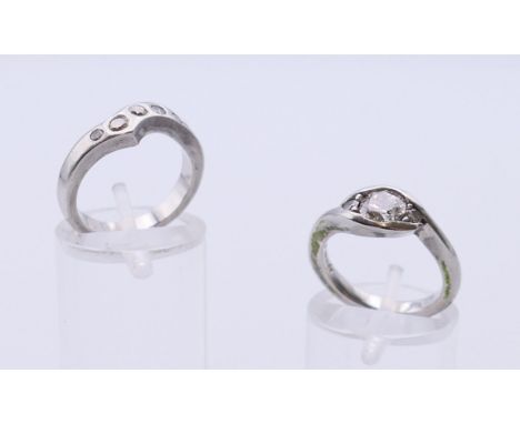 A platinum and diamond engagement ring, the centre stone 0.67 carat, quality VS-2, colour F/G; together with a matching plati