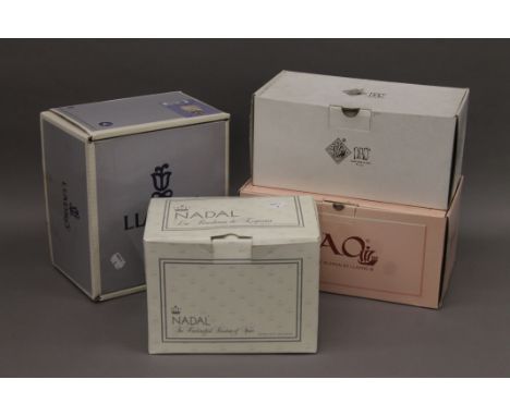 A boxed Lladro figurine, two boxed Nao figurines and a boxed Nadal figurine. The former 17 cm high.
