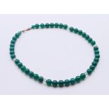 A silver and green agate and crystal necklace. 40 cm long.