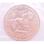 A 1974 Eisenhower uncirculated silver dollar.
