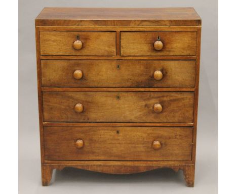 A 19th century mahogany caddy-top chest of drawers. 91 cm wide.
