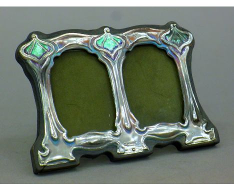 A small Art Nouveau-style double enamel frame. 11.5 cm wide.