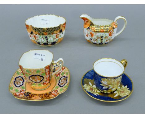 A small quantity of 19th century Spode porcelain items - two cups and saucers, a sugar basin and a cream jug. The latter 13 c
