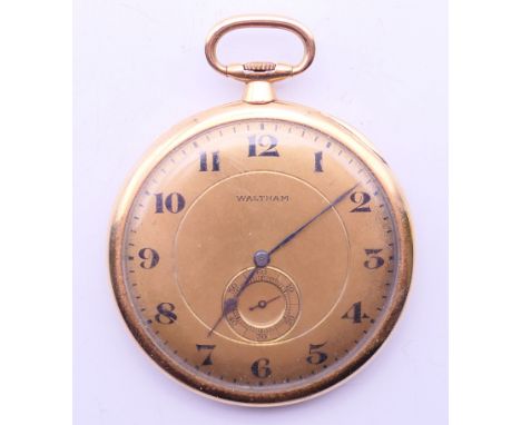A 14 K gold Waltham slim line pocket watch. 4.25 cm diameter. 40.1 grammes total weight. 