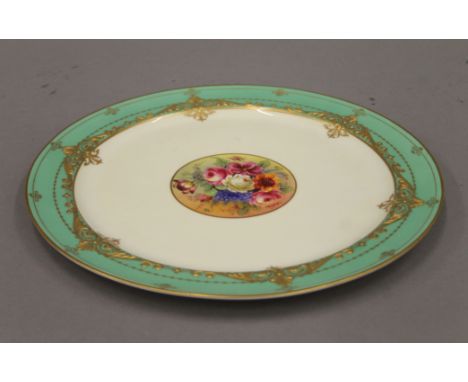 A Royal Worcester porcelain plate decorated by J Stanley. 26.5 cm diameter.