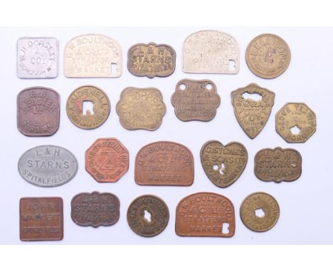 A quantity of various vintage market tokens. 