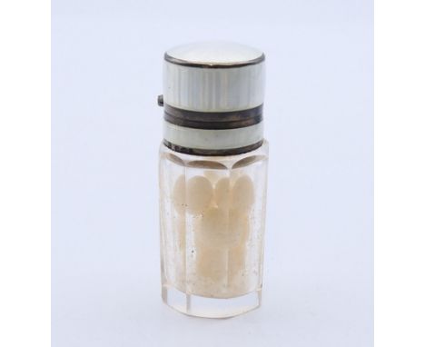 A silver enamel perfume bottle. 6 cm high. 
