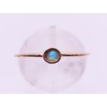 A 9 ct gold and opal ring. Ring size M/N.