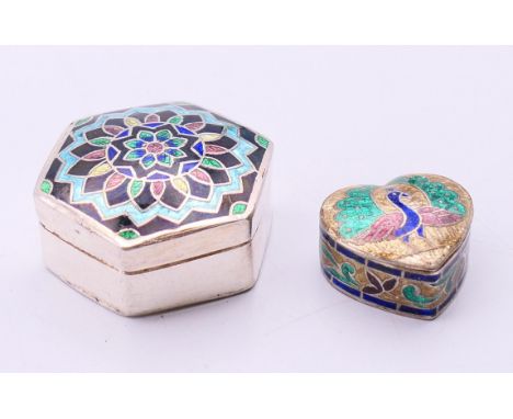 Two silver and enamel boxes. The largest 3.5 cm wide. 