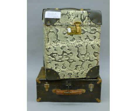 Two vintage cases. The largest 40 cm high.