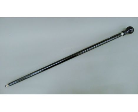 A Porche walking stick. 94 cm long.