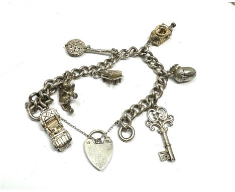 vintage silver charm bracelet with opening charms weight 50g