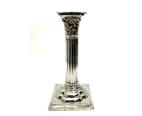 Antique silver corinthian column candlestick measures approx height 17cm London silver hallmarks filled base weight 330g