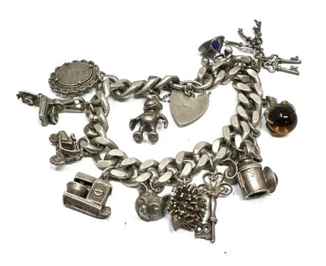 Heavy vintage silver charm bracelet weight 112g
