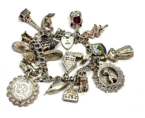 Vintage silver charm bracelet inc opening charms weight 62g