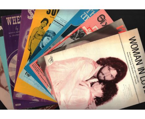 Sheet Music collection. Woman in love , I`m on fire, That’s when the music takes me, Soldier boy, Wheel of fortune and more. 