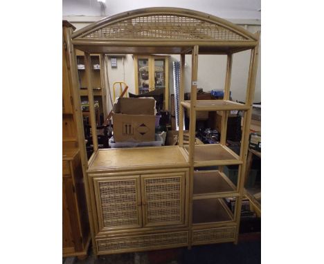 A Rattan Style Shelf and Cupboard Unit.