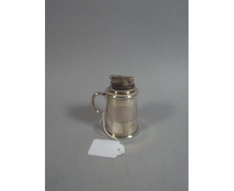 A Silver Novelty Table Lighter in The Form of A Tankard Stamped Asprey London.